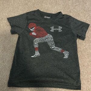 Boys football under Armour shirt